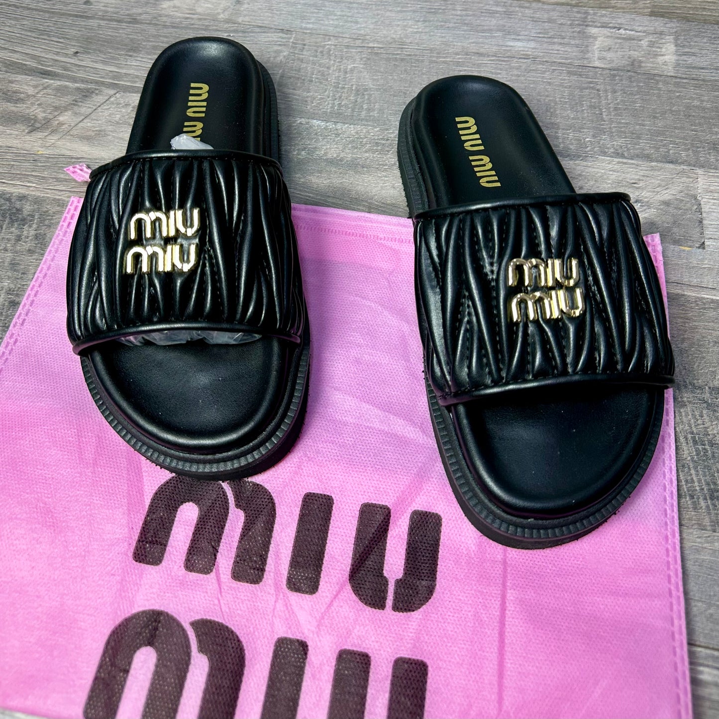 Miu Miu Slide Classic 2025